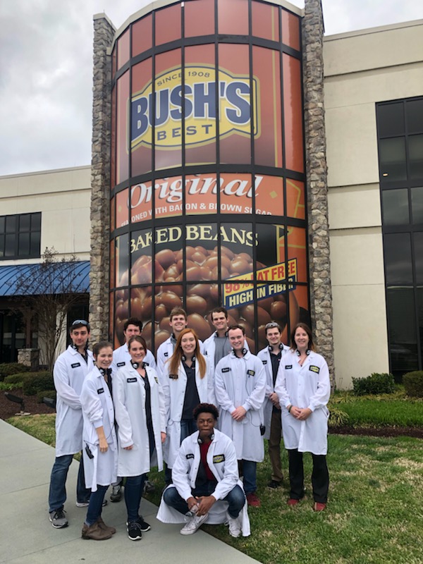 Cohort in Front of Bush Brothers Facility